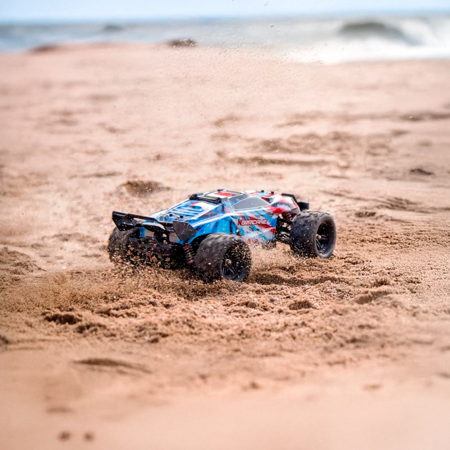 Auto a control remoto • Hurricane monster truck 4x4 • 36 Km/h • Celeste/rojo