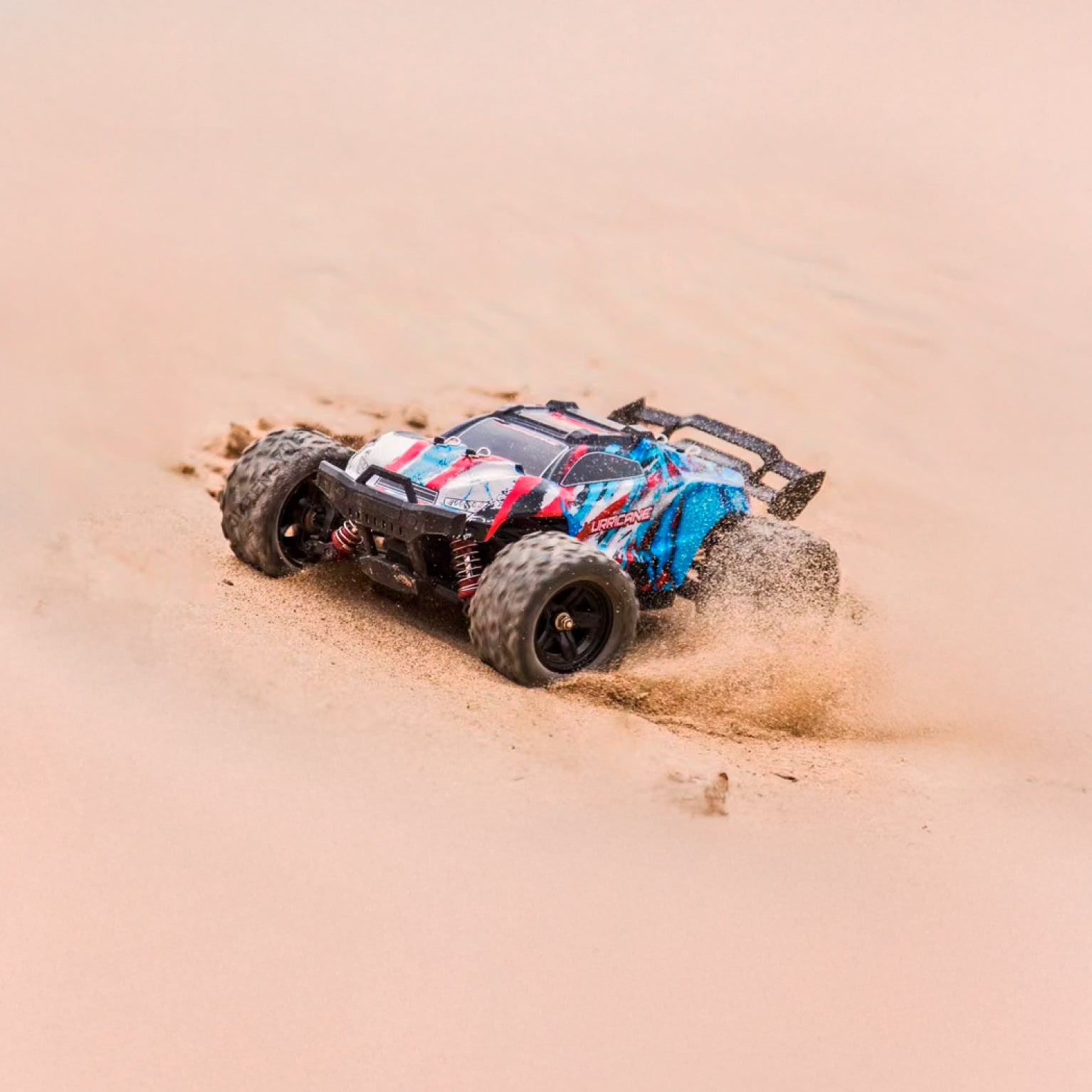 Auto a control remoto • Hurricane monster truck 4x4 • 36 Km/h • Celeste/rojo